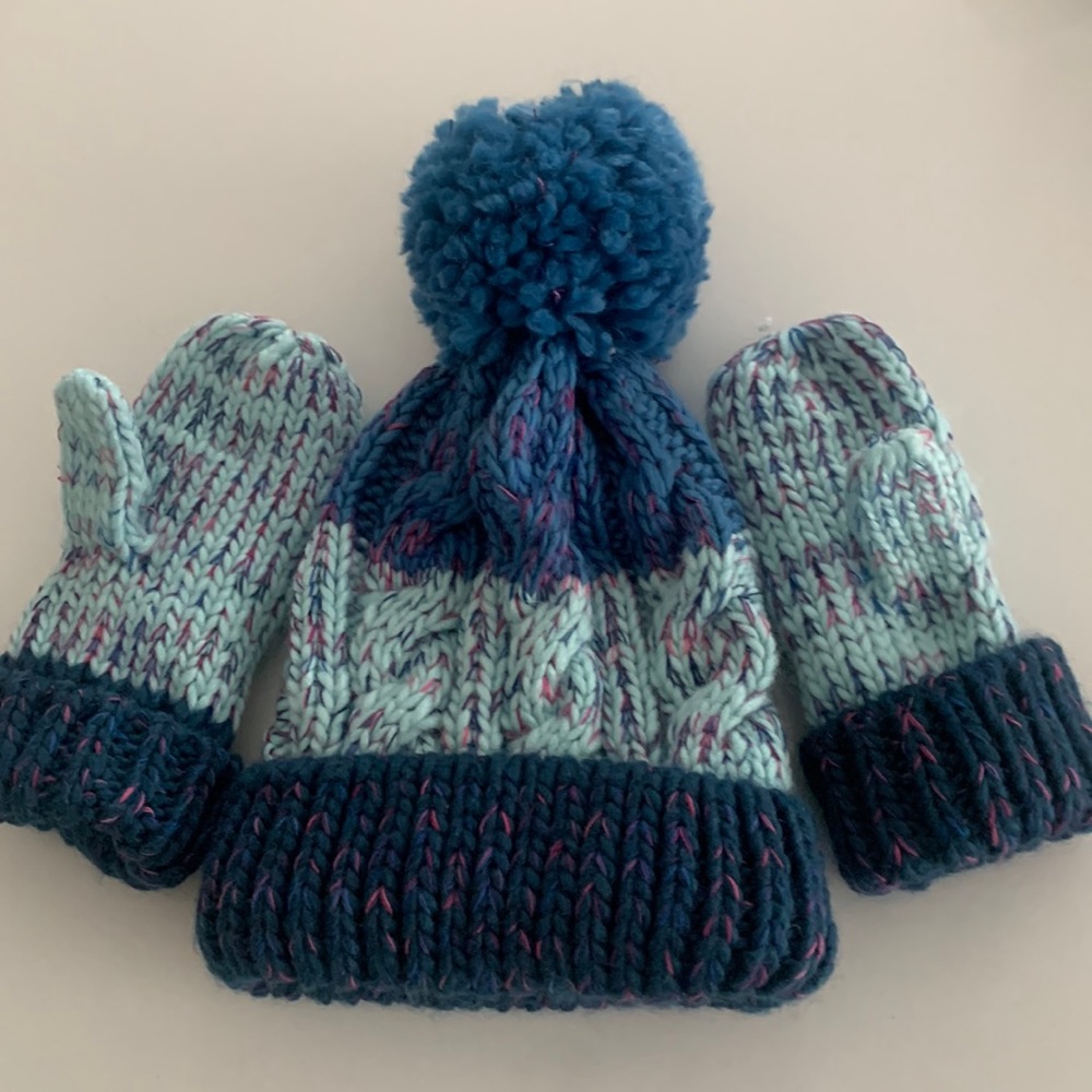 Beautiful colored knitted hat and glove set